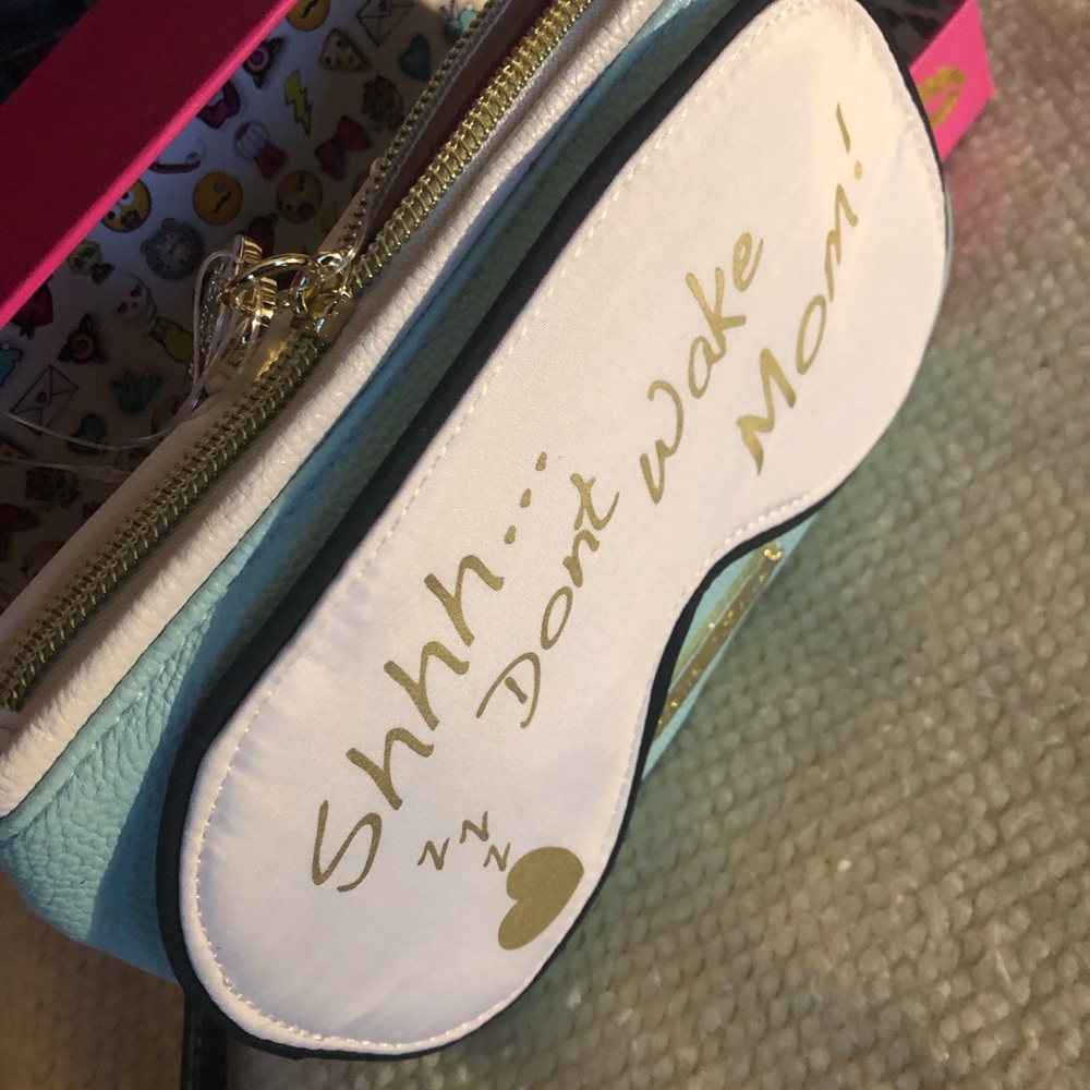 Betsey Johnson cosmetic bag with sleep mask